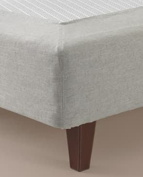 The bed cover Base cover on a DUX bed with tapered legs